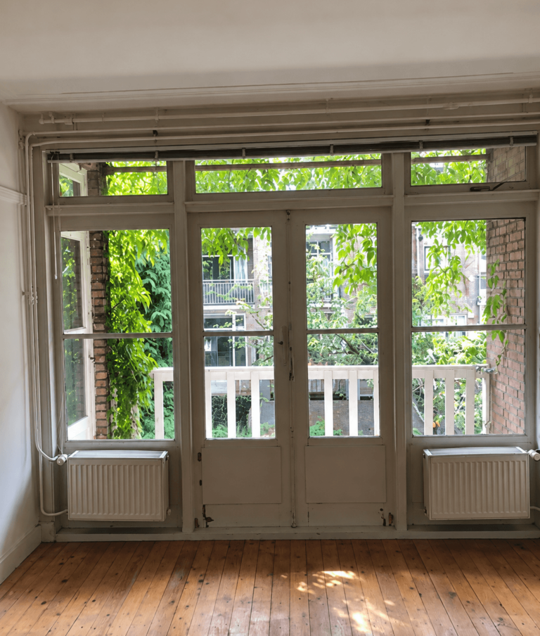 Glas vervangen glazen pui met houten kozijnen door aannemer gigant in Rotterdam